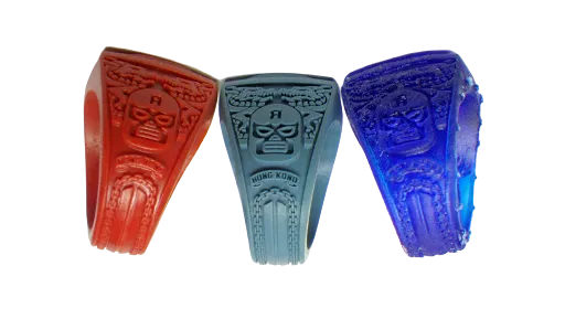 Three rapid-prototype resin ring models in red, grey and blue